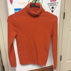 Orange turtleneck